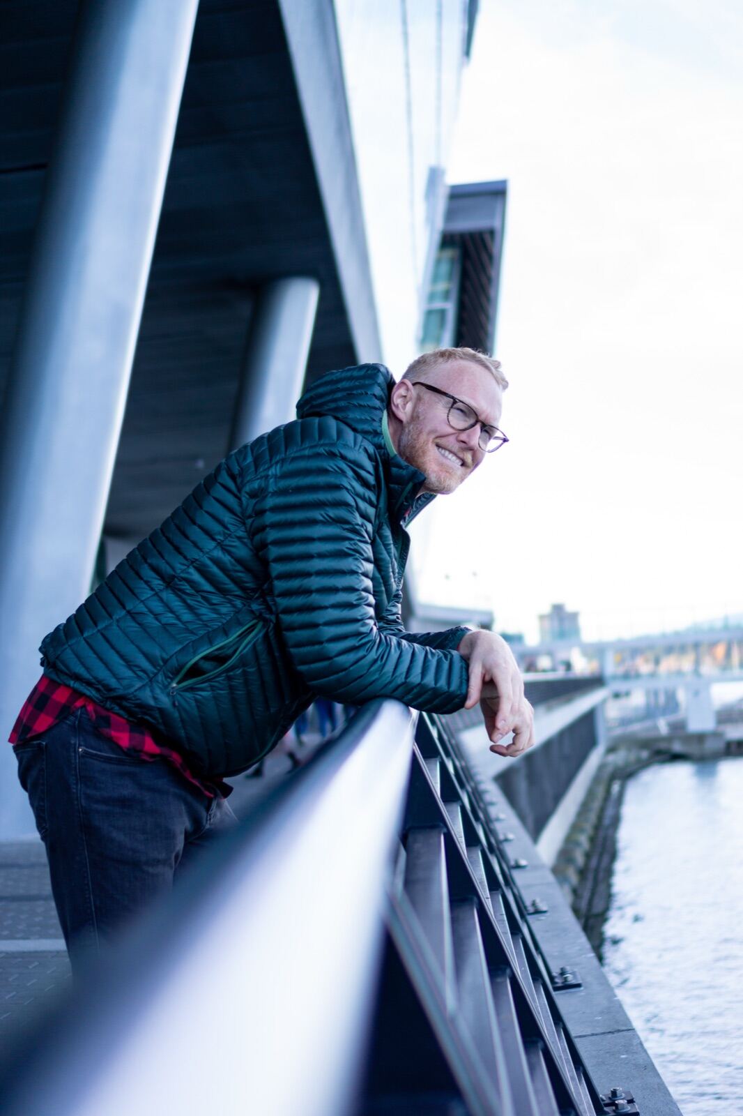 Portrait on a riverside bridge walkway