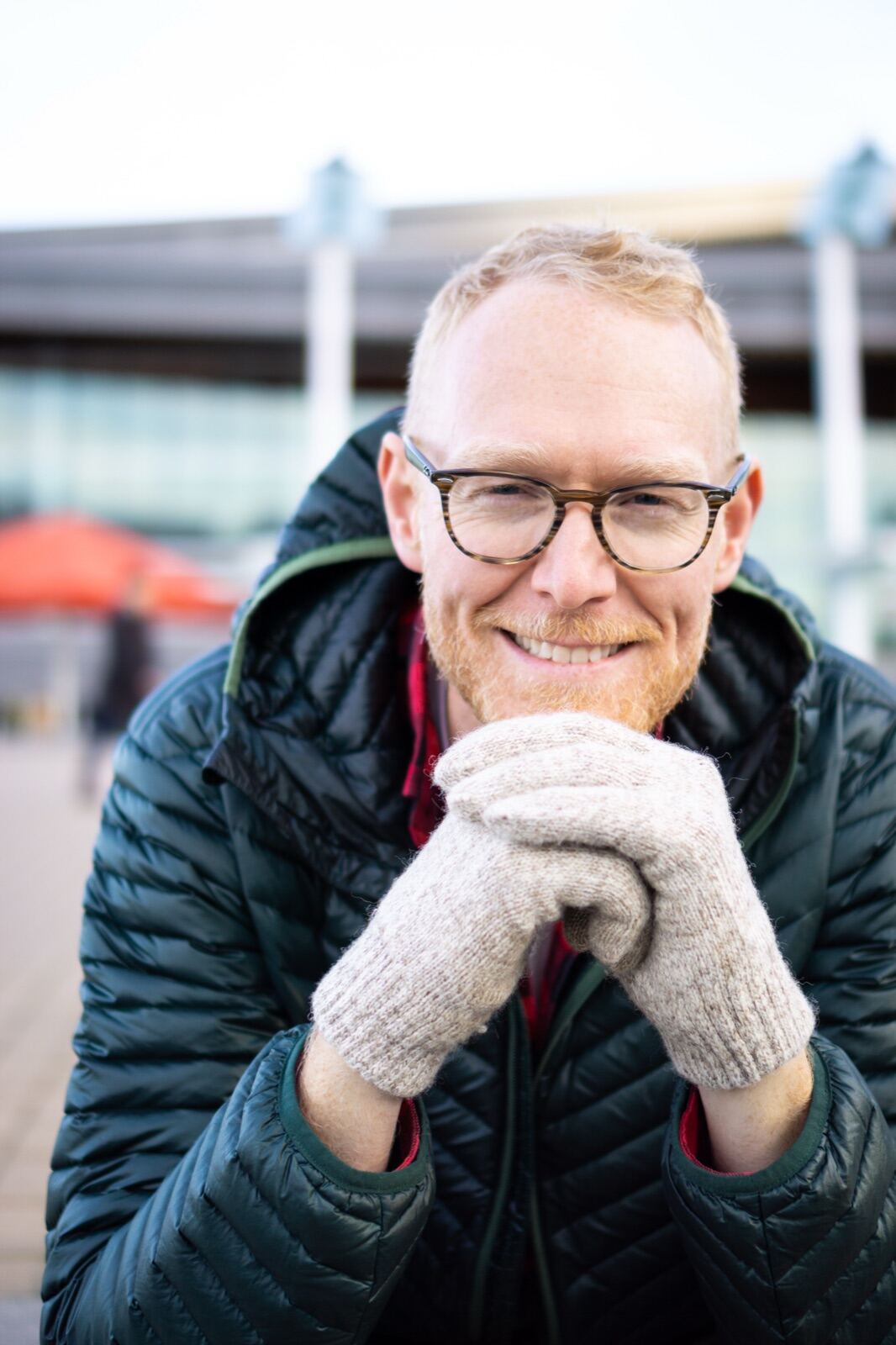 Cosy winter portrait with wool gloves