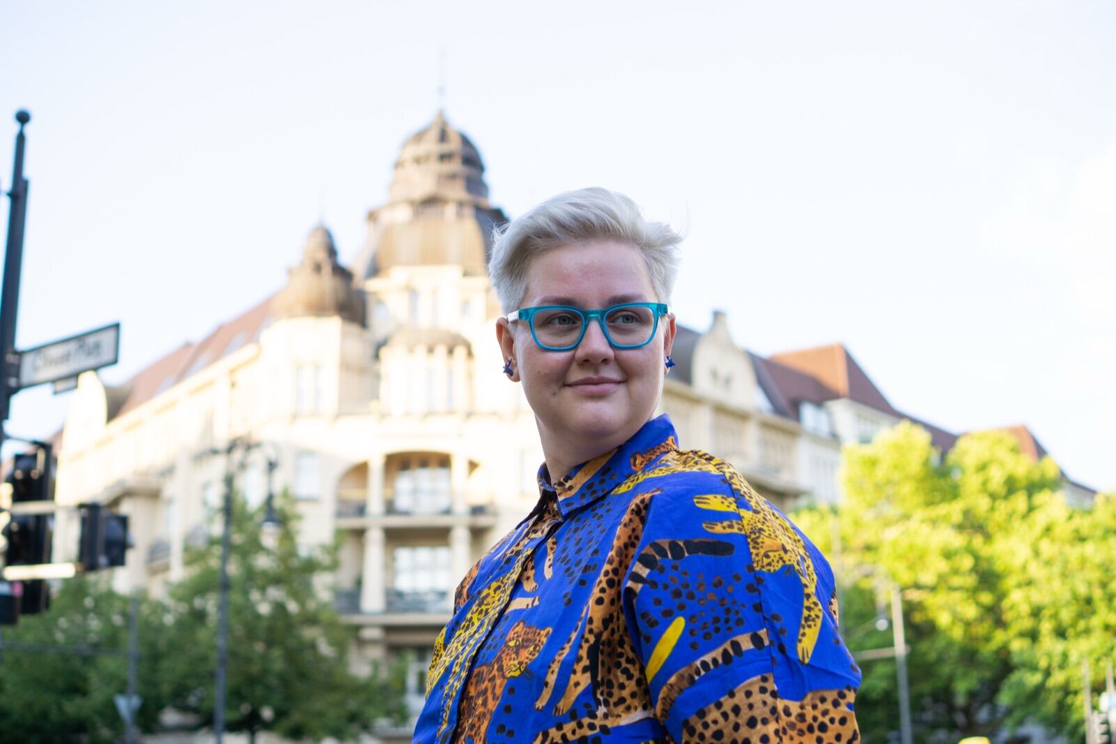 Portrait in front of a historic building