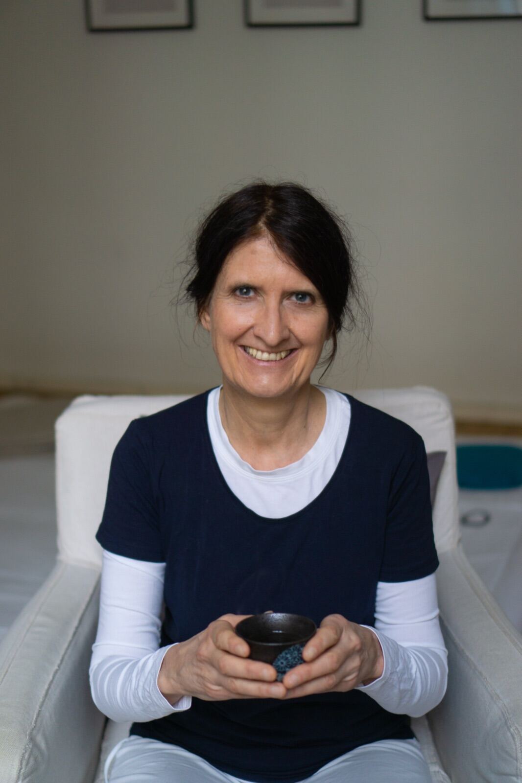 Portrait with a tea bowl in a calm studio