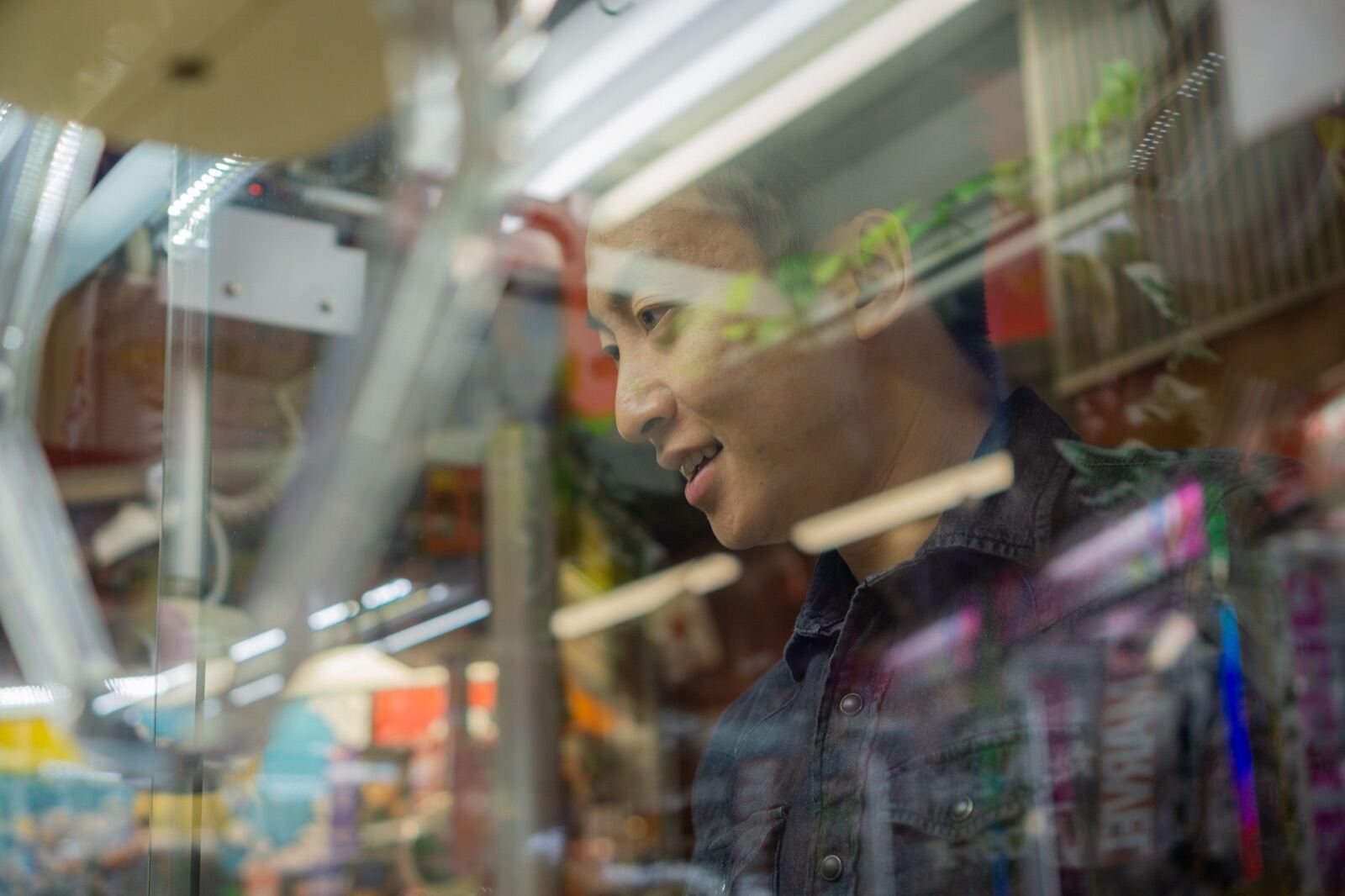 Reflection portrait in a shop window